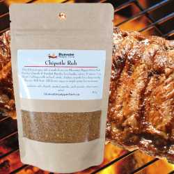 Chipotle Rub package with BBQ in background