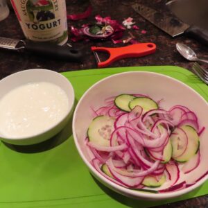 garlic yoghurt and quick pickle toppings